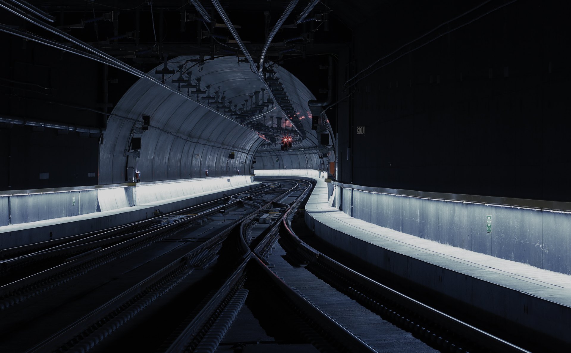 Modern tunnel interior with continuous LED lighting along both sides